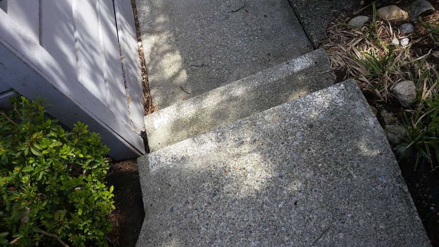 Pressure washing siding